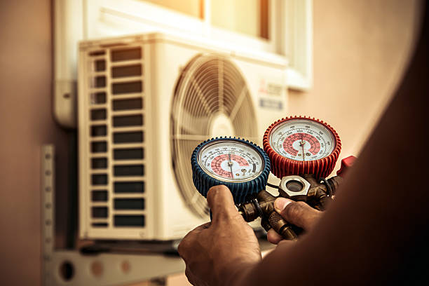 Professional Ductwork Repair technician working in Dover, AR